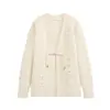 Atacado de roupas femininas transfronteiriças 2026 nova temporada outono e inverno estilo europeu e americano jaqueta cardigan longo de tricô decorado com rebites para mulheres