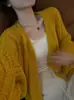 Cárdigan de punto hueco casual y suave que reduce la edad para mujer, nueva chaqueta de punto holgada para principios de otoño 2026