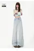 Novidades para Outono/Inverno 2026: Jeans feminino stretch, de cintura alta, com dois botões, perna larga e comprimento até o chão, com caimento solto e fluido. Dropshipping disponível