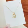 2026 Nuevo Color-Preservante Extra Largo Collar al por Mayor Nicho Versátil Hoja Mariposa Ángel Colgante Cadena Clavícula Joyería para Mujeres