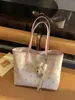 Bolso de mano de moda de gran capacidad para mujer, nuevo modelo 2026, bolso de hombro elegante y versátil, bolso tote de lunares de alto valor para el día a día