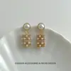 Pendientes de Cesta Elegantes Calados Estilo Nuevo 2026 para Mujer, Diseño de Nicho de Lujo Ligero, Accesorios para Orejas Únicos de Alta Gama