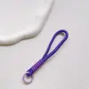 Correa de Muñeca Trenzada Estilo Ins Lanyard Nudado Cuerda Corta de Silicona Colgante Antiperdida para Teléfono Dopamina