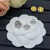 Brincos Tb Brand de Superfície Lisa para Mulheres, Design de Nicho com Sensação de Alto Padrão, Brincos de Luxo Leve, E-commerce Transfronteiriço Europeu e Americano, Venda Direta da Fábrica