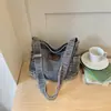 Bolso de tela artístico vintage transfronterizo 2026, gran capacidad, correa ancha para el hombro, bolso cruzado de mujer moderno y sencillo