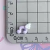 Mini Accesorios de Resina con Forma de Ala de Nota Musical Símbolos Musicales Pequeños Decoración para Funda de Teléfono Pasador Materiales de Decoración con Pegamento de Crema Hecho a Mano