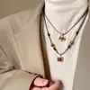 Colar com Cordão de Couro e Pedra Olho de Tigre para Mulheres, Corrente Elegante de Suéter Outono/Inverno de Alto Padrão, Acessório Popular de Novo Estilo 2024