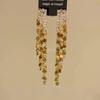 Pendientes elegantes con borlas y lentejuelas de diamantes de imitación para otoño e invierno, pendientes de lujo ligeros de alta gama para mujer, pendientes únicos para rostro pequeño.