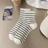 Calcetines a rayas de otoño e invierno para mujer, calcetines de media pantorrilla en blanco y negro, calcetines cortos deportivos blancos de estudiante para primavera y verano, calcetines de lunares de moda para exteriores