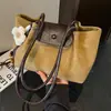 Bolso pequeño vintage de textura de alta calidad para mujer 2026 nuevo estilo moderno versátil de un solo hombro para llevar debajo del brazo bolso de mano para ir al trabajo