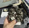 Goma de pelo scrunchie de leopardo retro de nicho para volumen de cabello pequeño, Cuerda para moño, Cuerda de pelo coreana nueva para coleta
