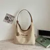 Bolsa de lona de alta moda estilo coreano, novo modelo de verão 2026, bolsa tote moderna e requintada para trabalho e deslocamento, bolsa de ombro