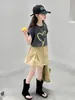 Conjunto de Verano de Manga Corta para Niñas 2026 Nuevo Estilo Falda Media para Niñas Falda de Verano Única y Hermosa Conjunto para Niñas Mayores