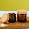 Tapa de Madera de Bambú Botella Marrón Crema Cosméticos Portátiles Sub-Botella Loción Corporal Crema para Ojos Crema Facial Botella de Vidrio a Prueba de Luz Venta al por Mayor