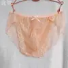 Cueca masculina de renda, sexy, plus size, em tela, preta e rosa, sedutora, transparente, com bolsa fina.