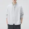 Camisa masculina de manga longa estilo casual japonês, outono 2026, corte solto, gola de lapela, tecido Oxford, jaqueta camisa versátil, atacado