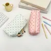 Bestseller transfronterizo bolsa de maquillaje portátil de gran capacidad para mujer, bolsa de almacenamiento de diseño exclusivo de lunares para lápiz labial y cosméticos