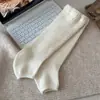 Calcetines holgados de tubo recto para mujer otoño invierno calcetines largos de punto retro calentadores de piernas adelgazantes versátiles calcetines de café a media pantorrilla