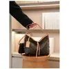 Bolso de alta gama para mujer 2026 nuevo temperamento versátil para el trabajo gran capacidad estampado de moda retro bolso de hombro cruzado