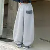 Pantalones de chándal a cuadros con retazos para niña 2026 Nuevas llegadas de otoño Niños medianos y grandes Pantalones deportivos casuales Pantalones de pierna ancha Pantalones para niños Pantalones largos