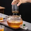 Espuma EPE embalaje transfronterizo hervidor con asa de cobre tetera doméstica de alto borosilicato asa para tetera infusor de té tetera de cerámica eléctrica