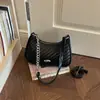 Bolsa de Ombro Simples com Textura Trançada 2026 Nova Moda de Verão Bolsa de Ombro Único Estilosa para o Dia a Dia Bolsa Transversal