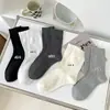 Calcetines de algodón peinado para mujer de primavera y otoño hasta la pantorrilla, calcetines básicos lisos de moda para mujer, calcetines blancos apilables