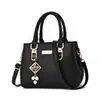 Bolso cuadrado pequeño bolso de mano para mujer bolso de hombro simple bolso de gran capacidad bolso bandolera de doble bola de pelo al por mayor transfronterizo