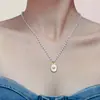 Collar con Colgante de Estrella de Ocho Puntas de Nácar Natural Estilo Palacio Cadena de Perlas de Imitación Joyería de Acero de Titanio de Lujo Accesible para Mujeres