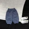 Pantalones de bebé a rayas estilo coreano, nueva colección de otoño, pantalones deportivos casuales multicolores para bebés y niños pequeños, pantalones tipo zanahoria de corte holgado con puños elásticos