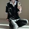 Camisa Polo estilo americano, diseño de nicho de verano para hombre de manga corta tipo dos piezas falsas, camiseta de retazos a rayas, manga corta de alta gama para pareja