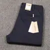 Calça Masculina Outono e Inverno 2022 Corte Reto Slim Micro Elástica Versátil Respirável Confortável para Negócios Algodão Tencel Cor Sólida Calça Casual Preta