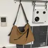Bolsa de trabajo y para el día a día de gran capacidad transfronteriza de verano, modelo nuevo 2026, bandolera de un solo hombro de alta gama para mujer, bolsa de lona para exteriores