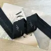 En stock en blanco y negro 3cm rejilla terciopelo cintura elástica banda elástica de malla banda de goma cintura de pantalón falda dobladillo de sujetador