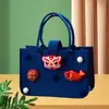 Bolsa de Feltro para Presente de Véspera de Natal Livro Vermelho Mesmo Estilo Mini Bolsa de Maçã Caramelada Bolsa para Embalagem de Presente Bolsa Tote