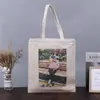 Bolsa de Lona Publicitária com Impressão Colorida Desenho Animado Material Escolar Armazenamento Bolsa com Zíper Bolsa de Ombro Portátil de Algodão Personalização