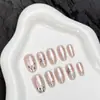 Tiras de Unha Pré-fabricadas Estampa de Leopardo Galvanizada Estrela de Cinco Pontas Cor Nude Curta Adesivos de Unha Usáveis Vendedor Quente para Transmissão ao Vivo Adesivos de Unha Olho de Gato