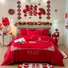 Juego de ropa de cama para boda, con bordado amigable con la piel, un juego de cuatro piezas con un vibrante diseño de dragón y fénix rojo, y tela de algodón de alto recuento, nuevo estilo 2026