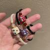 Livrinho Vermelho com Pulseira Tecida da Marca Fu de Monstrinho Fofo Design de Nicho Feminino Senso Avançado Corda de Mão de Gato