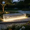 Banca de terrazo translúcido UHPC con patrón personalizado e iluminación integrada para paisajismo comunitario, fábrica de bancas de paisaje iluminadas