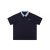 Camiseta a Cuadros de Empalme Contrastante Estilo Coreano de Manga Corta para Hombre Verano 2025 Nuevo Retro Holgada Ajustada Cuello Polo
