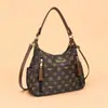 Nova bolsa de ombro estampada floral retrô 2026, grande capacidade, couro macio, bolsa de axila, versátil para o dia a dia, estilo crossbody ou bolsa de mão