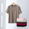 Nueva Camiseta de Manga Corta de Algodón Puro Peinado de 230g Cuello Redondo Manga Corta para Hombre y Mujer Casual Versátil Camiseta Publicitaria Uniforme de Clase