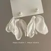 Aretes de Flor Amarilla Estilo Vacacional para Mujer 2025 Nuevo Estilo Caliente Sentido de Alta Gama Adecuados para Primavera Aretes de Botón Accesorios de Playa