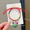 Pulseira de corda colorida zongzi do Festival do Barco-Dragão 2026 novo modelo pulseira trançada artesanal étnica infantil atacado corda vermelha