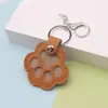 En Stock Nuevo Llavero con Huella de Pata de Mascota Estilo Japonés Bolsa para Guardar Pelo de Perro Colgante de Cuello Portátil para Gato y Mascota