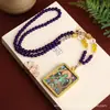 2024 Más Vendido Estilo Nacional Amatista de Imitación Multi-Tesoro Colgante Thangka Pintado a Mano Collar Multiusos Cadena para Suéter para Mujeres