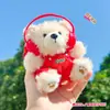 Chaveiro Pingente de Mochila Pelúcia Urso Fone de Ouvido Cool Série Urso Biscoito Presente de Ano Novo