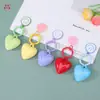 Llavero de color sólido Dopamina con forma de corazón y cara sonriente Accesorio DIY Llavero hecho a mano con cuentas Colgante para bolso