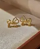 Novos Brincos de Tarraxa Cavalo com Laço para Mulheres Doce Fofo Temperamento Versátil Banhado a Ouro Brincos do Ano Zodiacal Transmissão ao Vivo Douyin